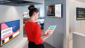 a girl looking at the digital signage